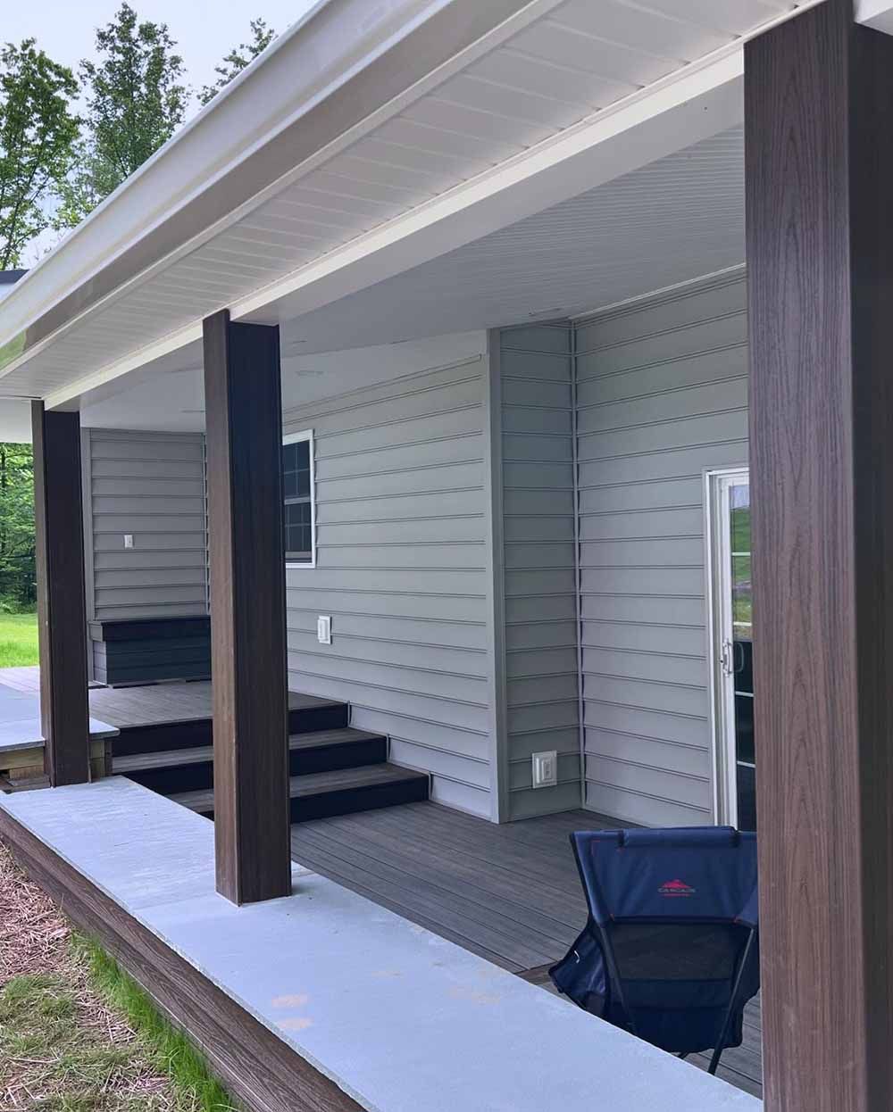 Covered patio by Hothouse Construction